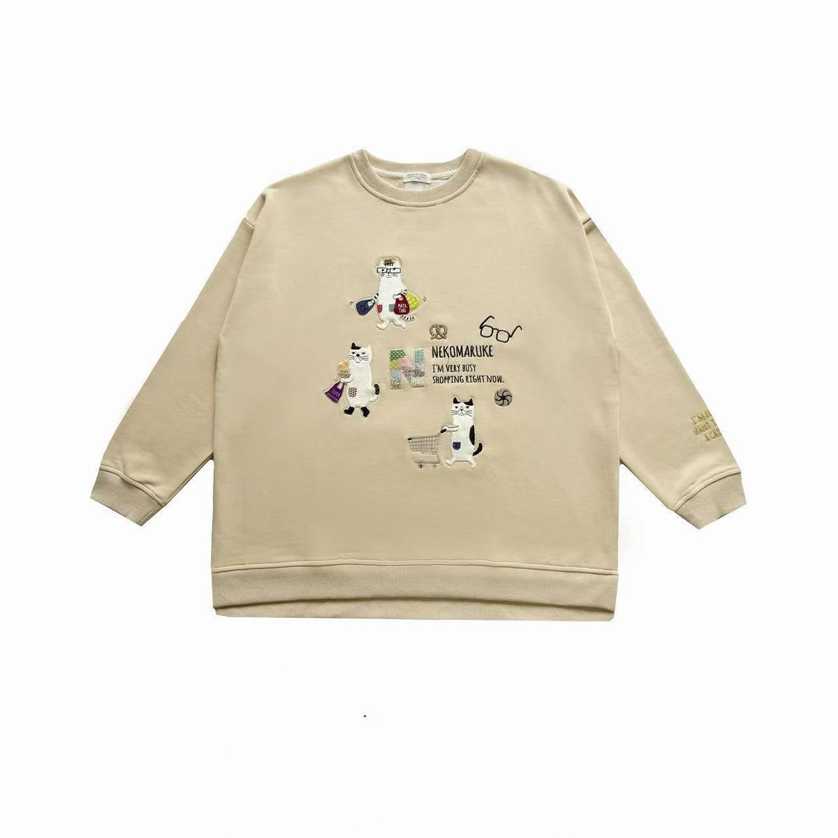 日本Kusuguru正品刺繡貓咪狗子大學T圓領休閒毛圈長袖寬鬆415432｜眼鏡貓米黃8631-1／單一尺寸