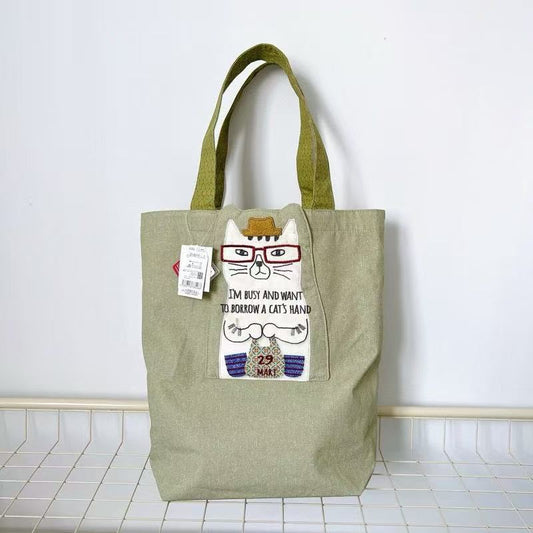日本Kusuguru正品刺繡眼鏡貓肩背包手提包手提包通勤購物補習400｜眼鏡貓米黃8514-2