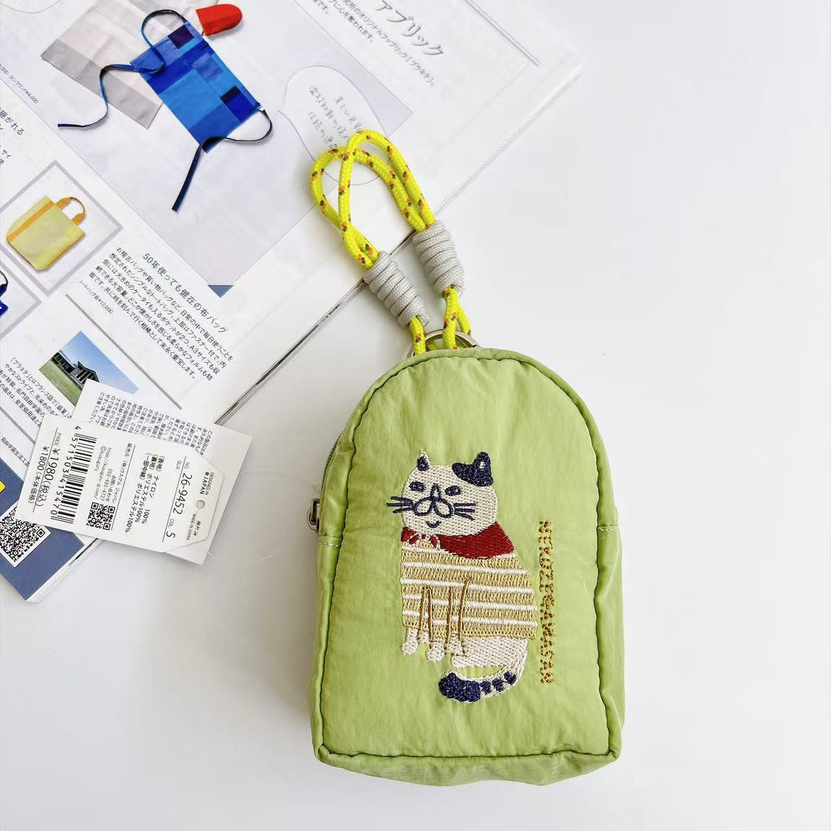 日本Kusuguru正品重工刺繡貓咪法鬥蜜豆零錢包掛飾收納包布藝卡通｜胖貓淡綠門形9452