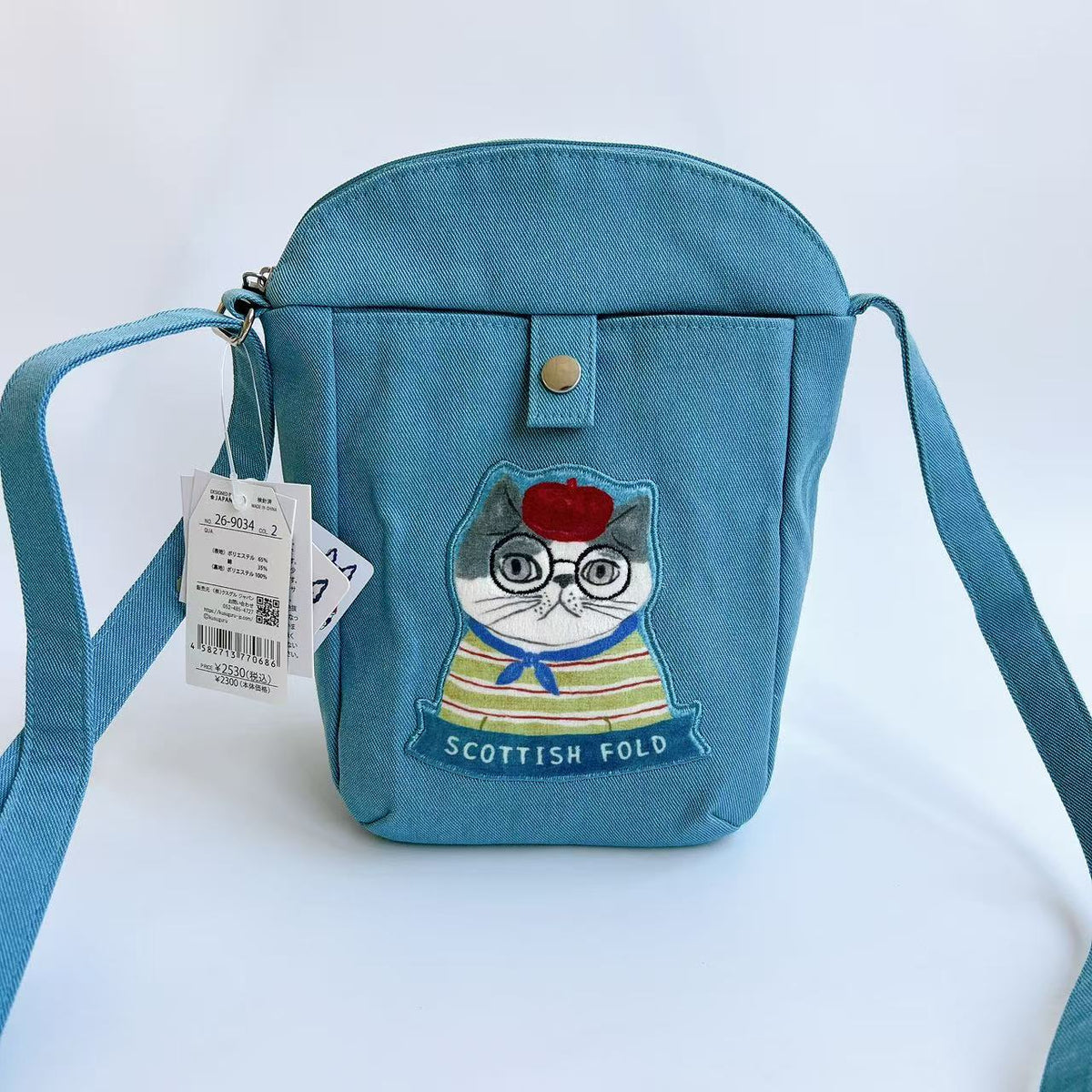 日本Kusuguru正品刺繡貓咪法鬥斜背包肩背包帆布通勤布藝卡通502｜保羅藍色9034-2