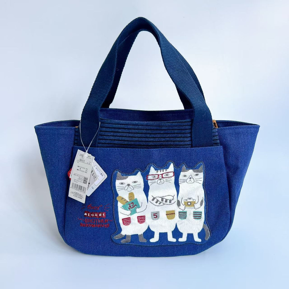 日本Kusuguru正品刺繡貓咪法鬥手提包手提包元寶包飯盒包帆布455｜眼鏡貓深藍455-2