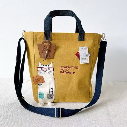 日本Kusuguru正品刺繡眼鏡貓斜背包肩背包手提包手提包補習包960｜眼鏡貓黃6518-2